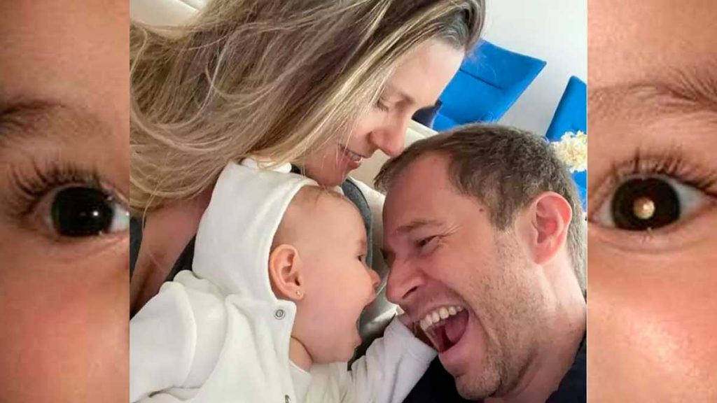 IMAGEM TRAZ O APRESENTADOR TIAGO LEIFERT COM SUA ESPOSA E SUA FILHA QUE RECEBEU DIAGNÓSTICO DE RETINOBLASTOMA